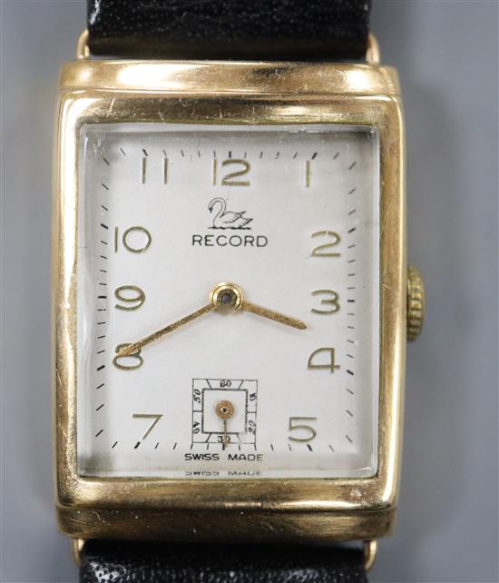 A gentlemans 1950s 9ct gold Record manual wind wrist watch, with rectangular Arabic dial and subsidiary seconds,